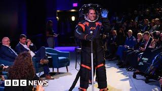 NASA unveils new spacesuit ahead of Artemis III moon mission - BBC News