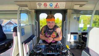 Walking DJ takes TRAIN to THEME park..