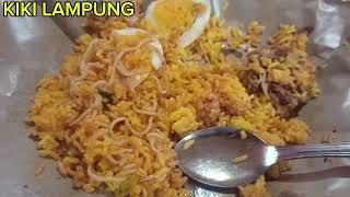 kiki lampung makan nasi kuning