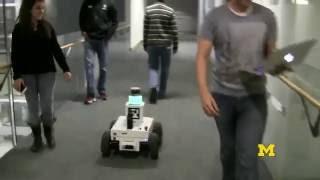 Robot Navigation in Dynamic Social Environments