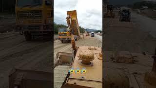 the truck dump stone and bulldozer was Push level #shots #constructionequipment #video