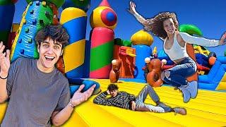 STAYING OVERNIGHT IN A GIANT BOUNCY HOUSE (24 hour challenge)