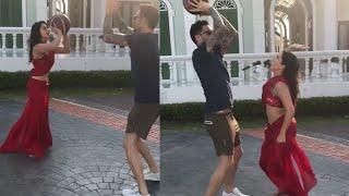 Sunny Leone Looks Beautiful In A Red Saree Playing Basket Ball With Husband