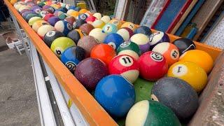 Giant orange hole rotating tunnel + artistic billiard ball