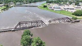 Severe flooding destroys train bridge; Extreme heat expected to last until July 4 in some areas