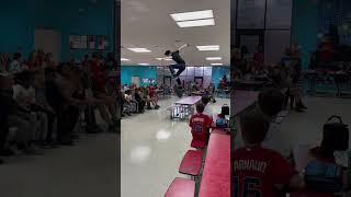 Kickflipping off the lunch table!