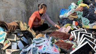 Nice...Lucky day for the trash girl as she picks up Apple iPhone and computers