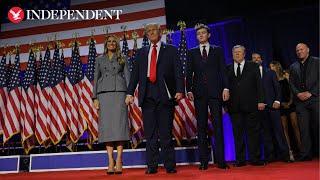 Trump joined by Melania, Baron and Trump children on stage at election party