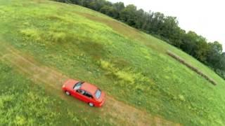 POS + FPV - Freestyling over a car at our FPV race track