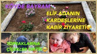 KÖYDE BAYRAMELİF ADANIN KARDEŞLERİNE KABİR ZİYARETİTOPRAKLARINA ÇİÇEKLER DİKTİK