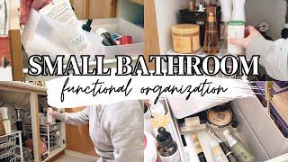 organize my small apartment bathroom // easy space saving solutions using only two main products!
