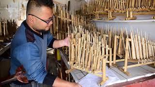 Playing an angklung in Bandung, Indonesia