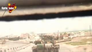 Syrian Arab Army soldiers inside a tank