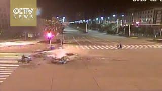 Surveillance camera records high-speed car crash