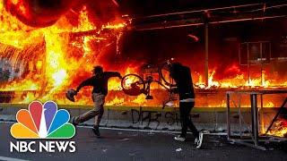 Rock-Throwing Students Met With Tear Gas In Indonesian Labor Law Protests | NBC News NOW