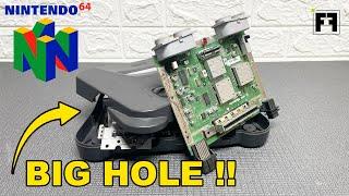 RESTORE and repair a DESTROYED Nintendo 64 with a BIG HOLE!!