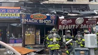 3 firefighters injured after storefronts come crashing down after Washington Heights fire