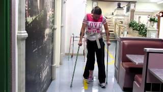 SCI patient walking with loftstrand crutches, bi-lateral AFOs Feb 2012