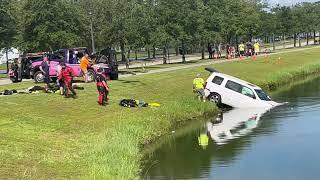 Vehicle being pulled out of a pond in market common, Myrtle Beach.