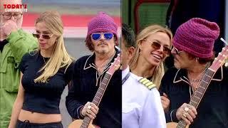 Johnny Depp seen cozy with a mysterious blonde at London Heliport