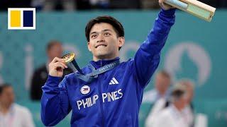 Philippine Olympic gold gymnast Carlos Yulo showered with gifts