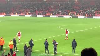 Mesut Ozil embraces Jose Mourinho and the Manchester United bench at full time