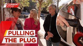 Couple threatened with fine for using electric vehicle charger cable in public | A Current Affair