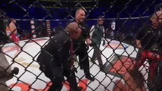 Bellator official pulls the stool away from an injured Michael Chandler