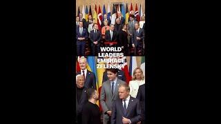 World leaders embrace Zelensky