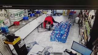 Guy falls off step stool in store