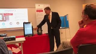 Dominion Voting Systems representative demonstrates voting machines