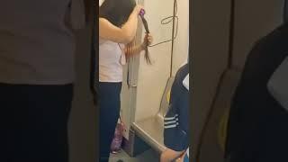 Woman Straightens Hair In Delhi Metro, WATCH | #Shorts | Viral Trending Video | News18 English