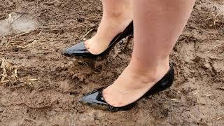 Louboutin in deep and slippery mud, louboutin stuck in mud, heels in puddles, heels abused (# 181)