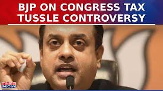 BJP's Sambit Patra Addresses Press Conference In Delhi, Slams Congress For Not Depositing Returns