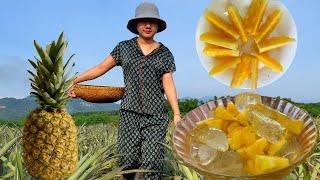 The village girl is making delicious pineapple dishes in her kitchen, cooling summer dish