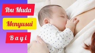 Ibu Muda Cantik Lagi Menyusui Bayinya