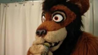 Kijani Lion drinking in fursuit