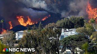 Wind storm hits peak as fires burn hundreds of acres in Los Angeles