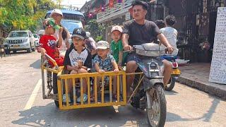 Jumbo ride by the Mekong river in Laos