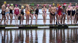 Swimmers brave chilly waters in annual Christmas Serpentine race