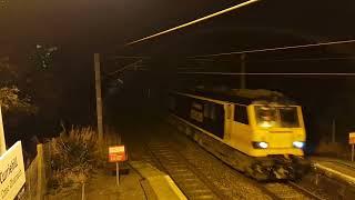 Caledonian Sleeper and passnger train cross at Curriehill