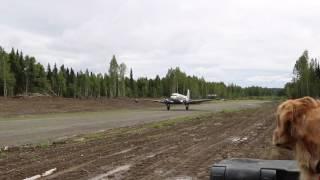 DC-3 landing at pvt gold mine near Skwentna, AK