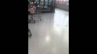 Little girl throws a dozen eggs on Wal Mart floor while mom