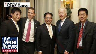 Newly surfaced photos show VP Biden posing with Hunter's business associates