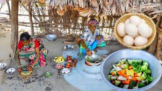 Mixed Vegetables cooking with Egg in village style by santali tribe couple for their lunch