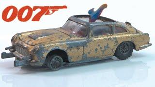 Corgi restoration Aston Martin DB 5 No. 261 Bond 007. Best selling model ever. Catapult.