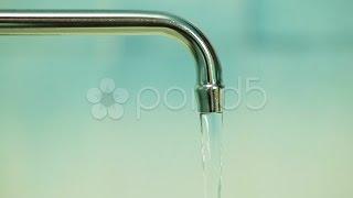 Water Flowing From Faucet. Stock Footage