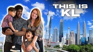 Indian husband playing tourist with his American family in KL