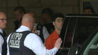 Suspect in killing of US health insurance executive exits court | AFP