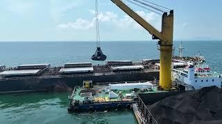 Coal Transshipment in Indonesia - Nemag Clamshell grab